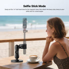 A girl is taking a selfie with NEEWER CA175 Action Camera Mounting Accessories Kit